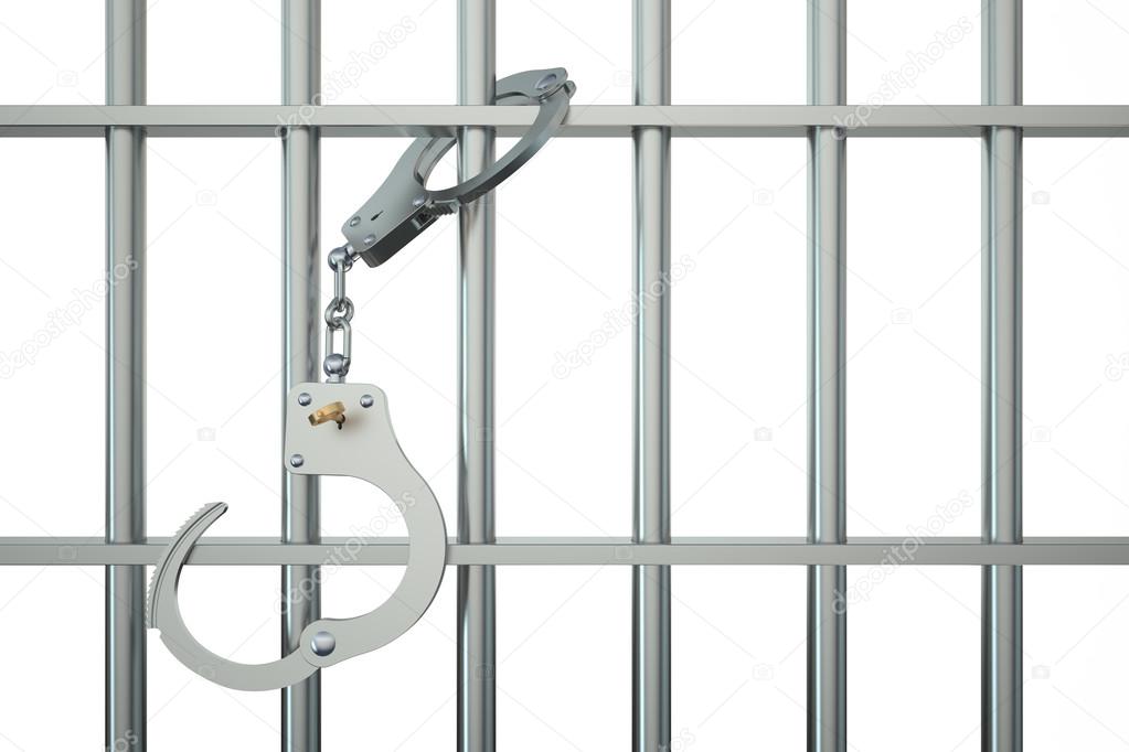 metal prison bars with handcuffs 