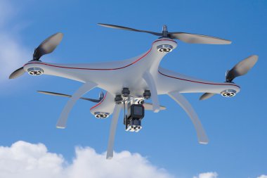 Beyaz dron mavi gökyüzünde uçan