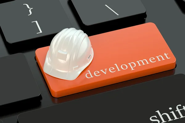 Development concept on red keyboard button — ストック写真