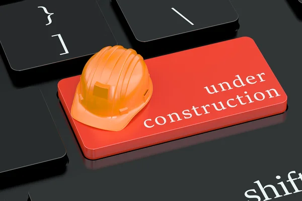 Under Construction concept on keyboard button — Stock Photo, Image