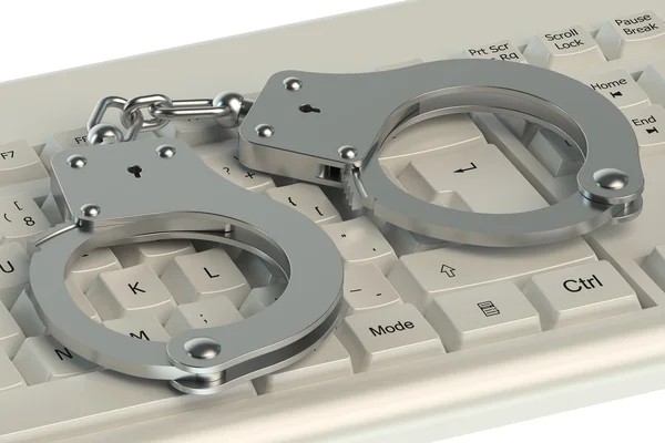 Internet-Verbrechenskonzept, Handschellen auf Computertastatur — Stockfoto