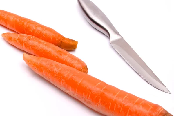 Carrots and knife — Stock Photo, Image