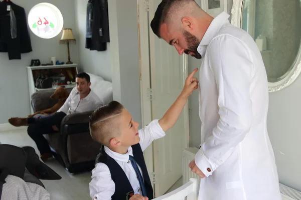 A young boy being best man for his father — Stock Photo, Image