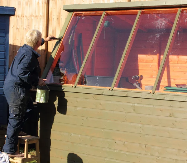 Painting a potting shed — Stock Photo, Image