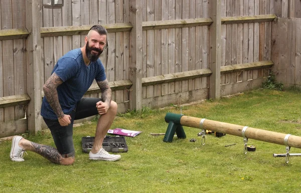 Building a childrens swing — Stok fotoğraf