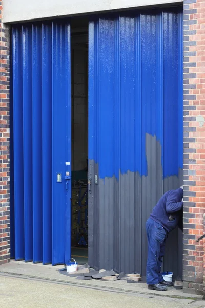 Een schilder op het werk — Stockfoto