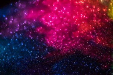 Doğum günü, yıldönümü, düğün, yeni yıl arifesi ya da Noel arifesi için parlak, bulanık ve soyut bir arka plan.