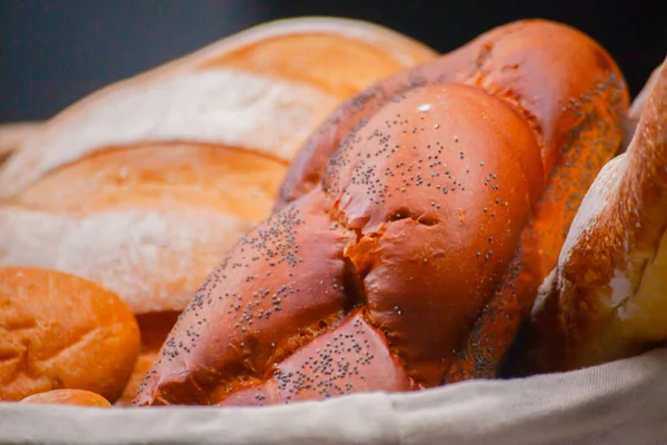 Different types of fresh bread in the kitchen — Stock Photo, Image