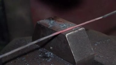 The process of working in a forge