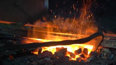 The process of working in a forge