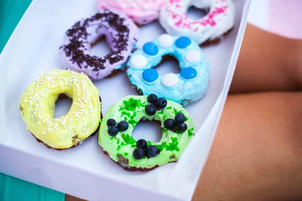 Sweets and colorful donuts. — Stock Photo, Image