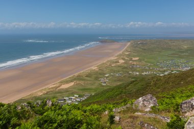 Rhossili beach The Gower peninsula Wales UK in summer clipart