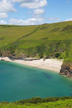 Secluded beach at Lantic Bay Cornwall England near Fowey and Polruan with turquoise and blue sea on a beautiful summer day