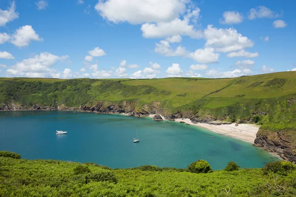 Secluded beach at Lantic Bay Cornwall England near Fowey and Polruan with turquoise and blue sea on a beautiful summer day