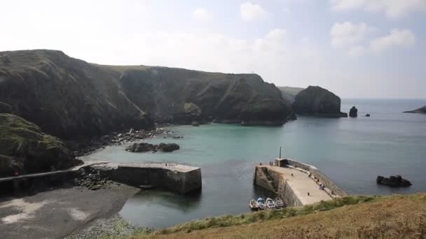 Mullion Cove harbour Lizard peninsula south Cornwall UK situated on Mounts Bay elevated view PAN — Stock Video
