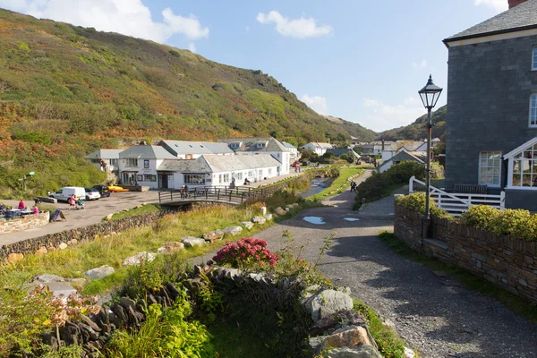 Tourists visiting Boscastle North Cornwall England UK between Bude and Tintagel on a beautiful sunny blue sky day — Stock Photo, Image