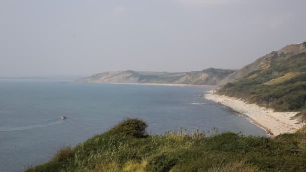 Vista desde Osmington Mills de la costa de Dorset Inglaterra Reino Unido entre Weymouth y Lulworth Cove — Vídeos de Stock