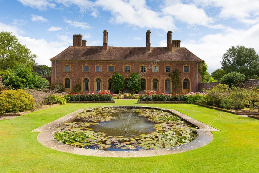 Strode House Barrington Court near Ilminster Somerset England uk with Lily pond garden
