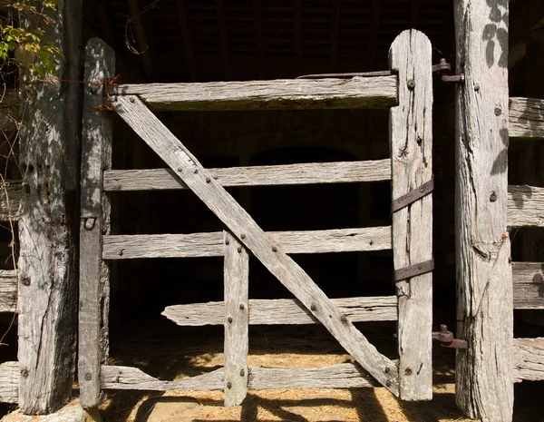 Very old wooden stable door hundreds of years old — Stock Photo, Image