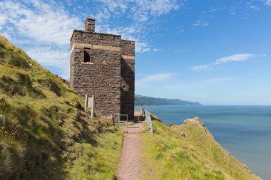 South west coast path near Porlock Somerset England UK old coastguard lookout tower at Hurlstone Point clipart