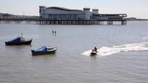 Weston-super-Mare seafront pier Somerset with jetski and sea view — Stock Video