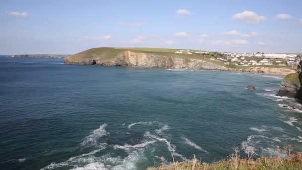Coast Mawgan Porth beach north Cornwall England near Newquay and south of Porthcothan and Treyarnon on a summer day with blue sky PAN — Stock Video