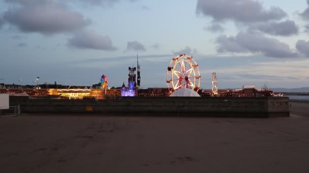 The Banksy Dismaland theme park in early evening in the disused Tropicana swimming pool in Weston-Super-Mare on Monday 21st September 2015 — Stock Video