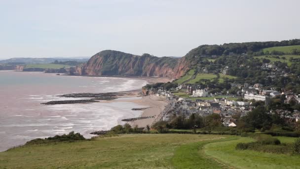 Sidmouth Devon with an elevated view of this English tourist town to the west — Stock Video