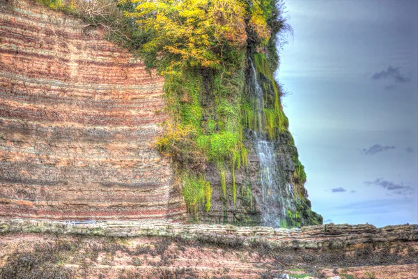 Şelale üzerinde plaj St Audries Bay Somerset İngiltere İngiltere Watchet renkli HDR yakınındaki — Stok fotoğraf