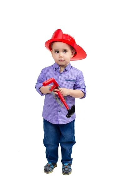 Treårig Pojke Röd Hjälm Med Leksaker Händerna Isolerad — Stockfoto