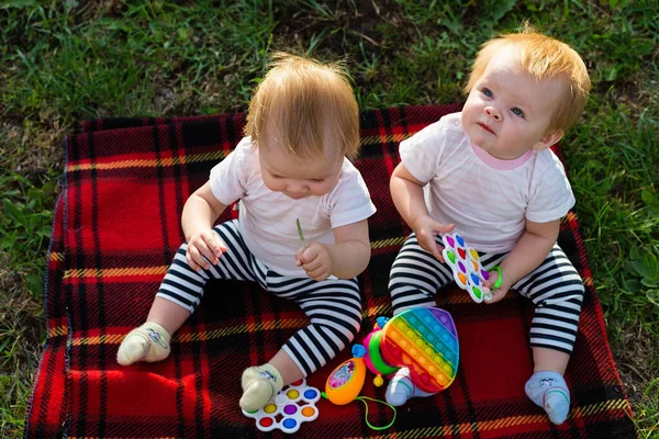 Two Twins Blanket Bright Toys Look — Stock Photo, Image