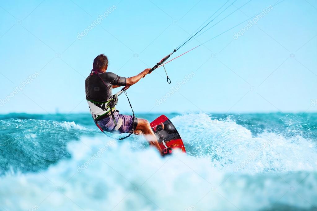 Kiteboarding, Kitesurfing. Water Sports. Kitesurf Action On Wave Stock