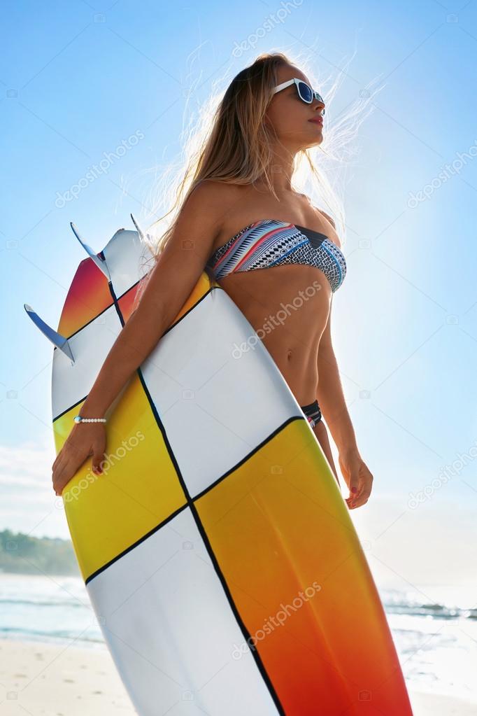 Recreational Summer Water Sports. Surfing. Girl Holding Surfboard