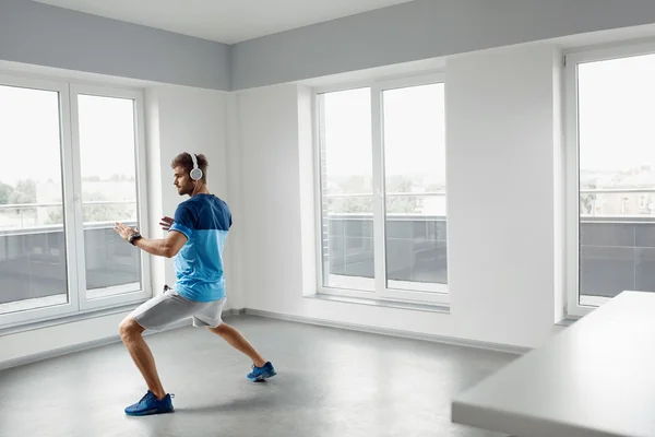 Man Workout Exercises. Fitness Male Model Exercising Indoors — Stock Photo, Image