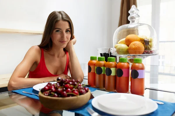 Healthy Food. Woman With Detox Smoothie In Kitchen. Nutrition