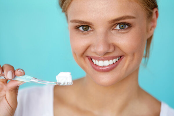 Woman With Beautiful Smile, Healthy White Teeth With Toothbrush