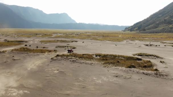 SUV car riding on mountain plateau in Indonesia — Stock Video