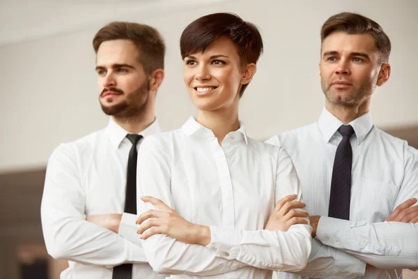 Smiling people standing in office — Stock Photo, Image