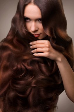 Hair. Portrait of Beautiful Woman with Long Wavy Hair. High qual clipart