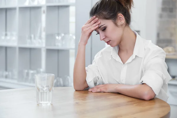 Portrait of woman with headache — Stock Photo, Image