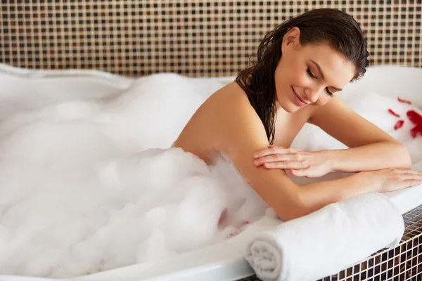 Spa Woman. Beautiful Woman in Bath Cares About Her Hands. Body — Stock Photo, Image
