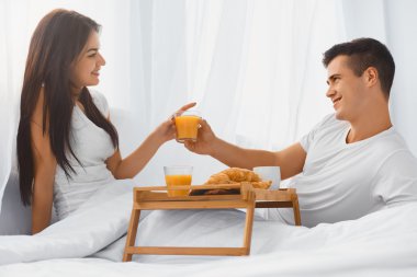 Couple eating breakfast in the morning