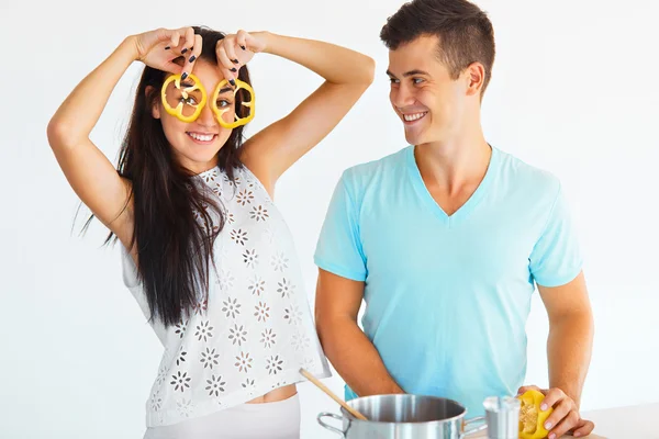 Couple having fun while cooking in the kitchen. — Stock Photo, Image