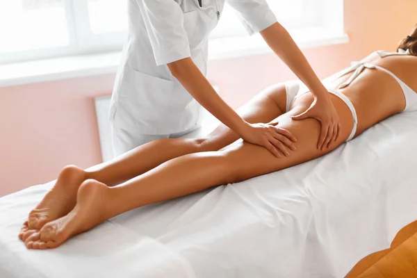Body care. Legs massage in spa salon — 图库照片
