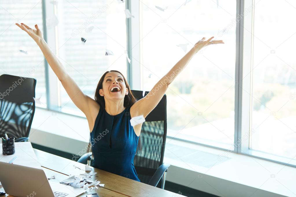 Young Business Woman Throwing Paperwork into The Air. Business P