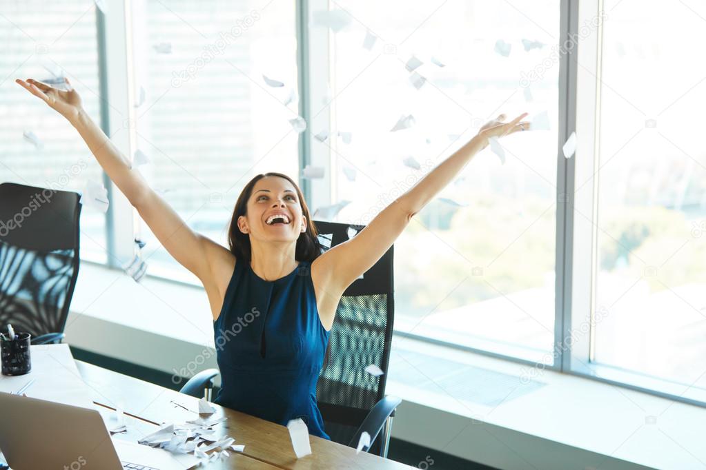 Young Business Woman Throwing Paperwork into The Air. Business P