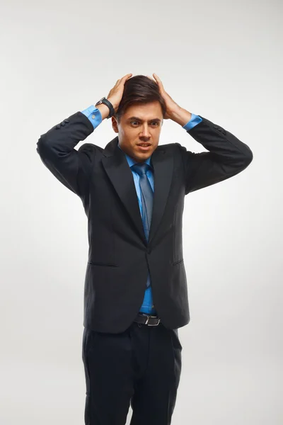 Stressed Businessman against white background — Stock Photo, Image