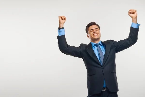 Business Man Celebrating Success against White Background Royalty Free Stock Photos