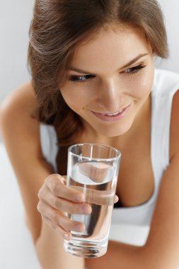 Health, Beauty, Diet Concept. Woman Drinking Water. Drinks. Wate