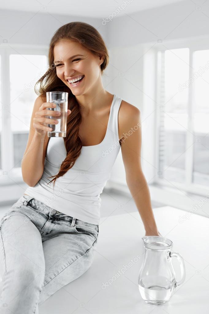 Healthy Lifestyle. Woman With Glass Of Water. Healthy Eating. Di